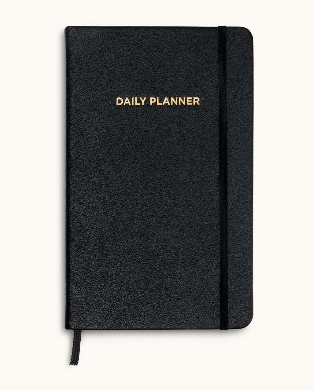 Black daily planner with gold-embossed title on textured vegan leather cover.