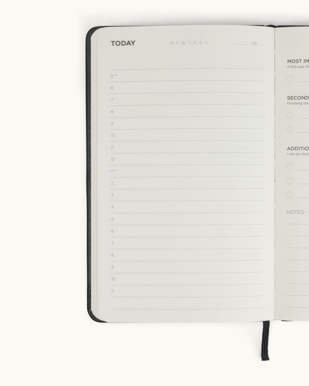 Open planner showing daily schedule page with hourly time slots.